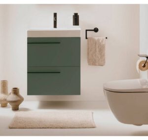 Meble łazienkowe, które cechują się funkcjonalnością i nowoczesnym wykończeniem w modnej zieleni